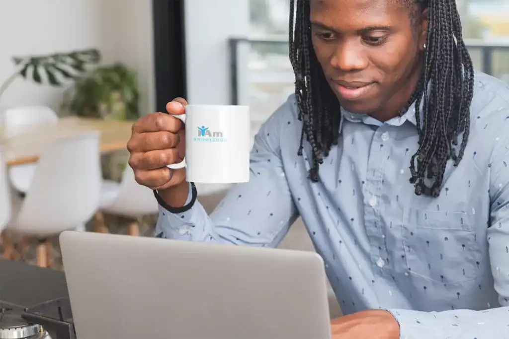 Coffee mug with "Iam" logo, showcasing brand identity.
