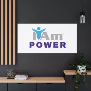 Inspirational wall art with 'I Am Power' message on a modern dark wall.