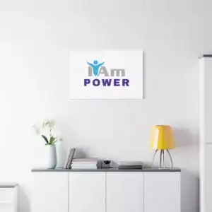 Inspirational wall art with 'I Am Power' message on a white wall.