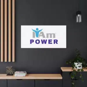 Inspirational wall art with 'I Am Power' message on a dark wall.