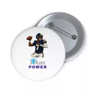Football player in uniform with 'I Am Power' badge for empowerment.