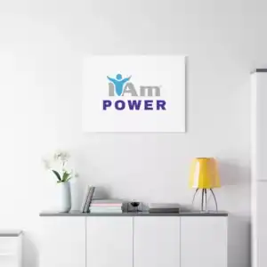Inspirational wall art with 'I Am Power' message on a white wall.