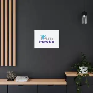 Inspirational wall art with 'I Am Power' message on a dark wall.