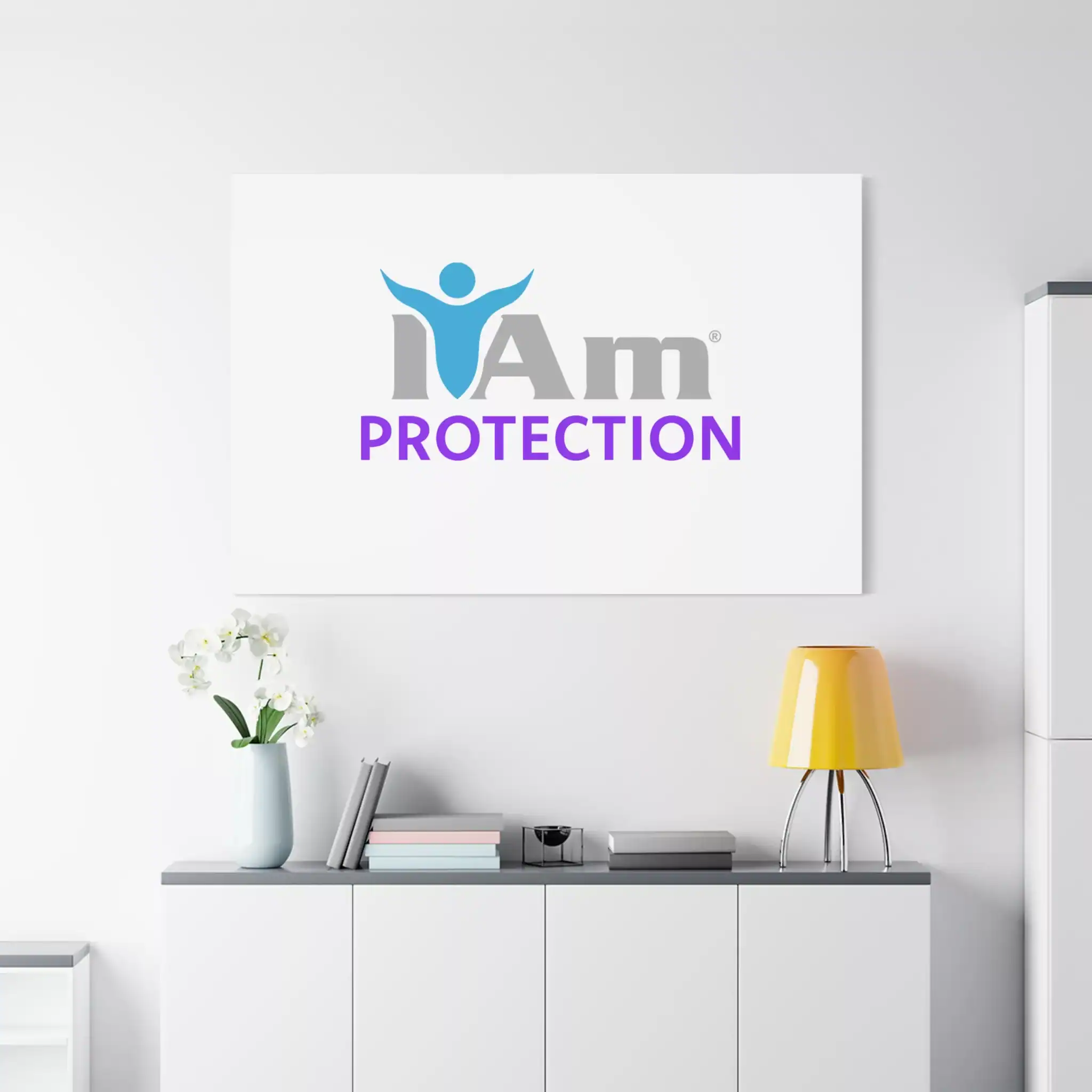 1623413733702217224_2048.webp I Am Protection logo on a white wall with modern decor.