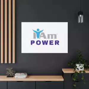 Inspirational wall art with 'I Am Power' message on a modern dark wall.
