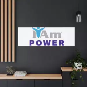 Inspirational wall art with 'I Am Power' message on a modern dark wall.