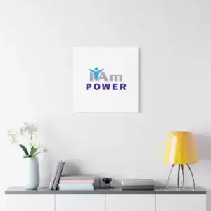 Inspirational wall art with 'I Am Power' message on a white wall.