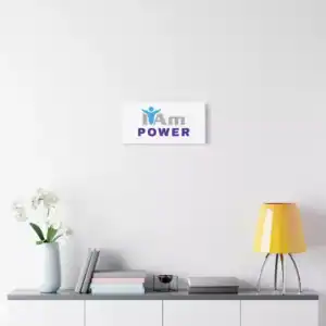 Inspirational wall art with the phrase 'I Am Power' on a white wall.