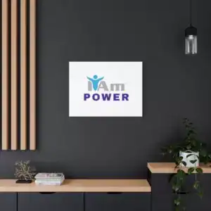 Inspirational wall art with the phrase 'I Am Power' on a dark wall.