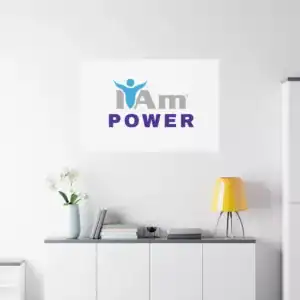 Inspirational wall art with 'I Am Power' message on a white wall.