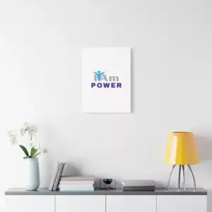 Inspirational wall art with 'I Am Power' message on a white wall.