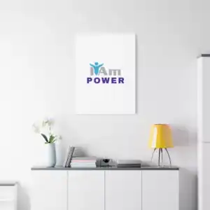 Inspirational wall art with 'I Am Power' message on a white wall.