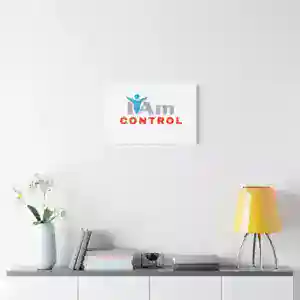 Inspirational wall art with 'I Am Control' message in modern home decor setting.