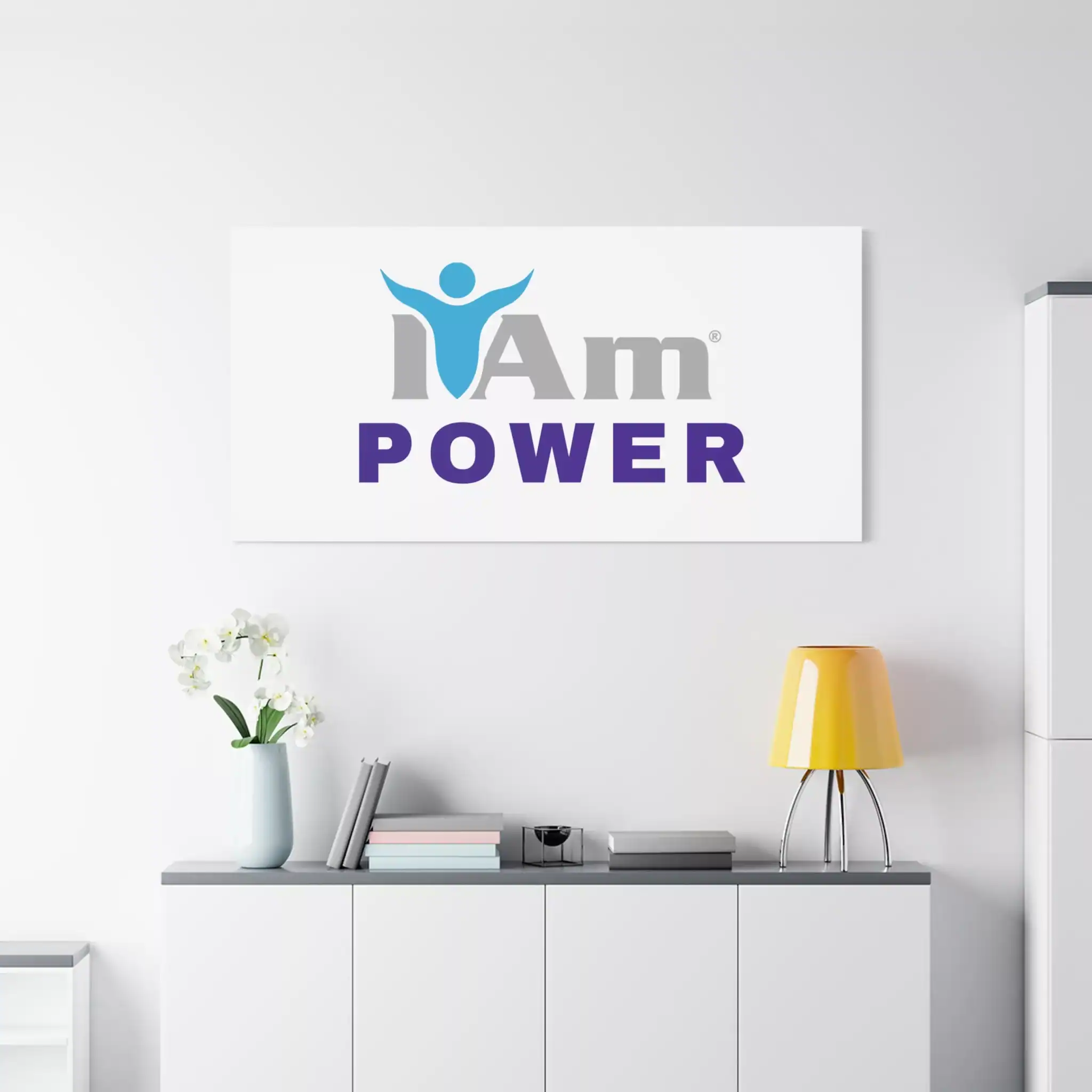 893868063249964974_2048.webp Inspirational wall art with 'I Am Power' message and logo on a white wall.