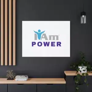 Inspirational wall art with 'I Am Power' message on a modern dark wall.