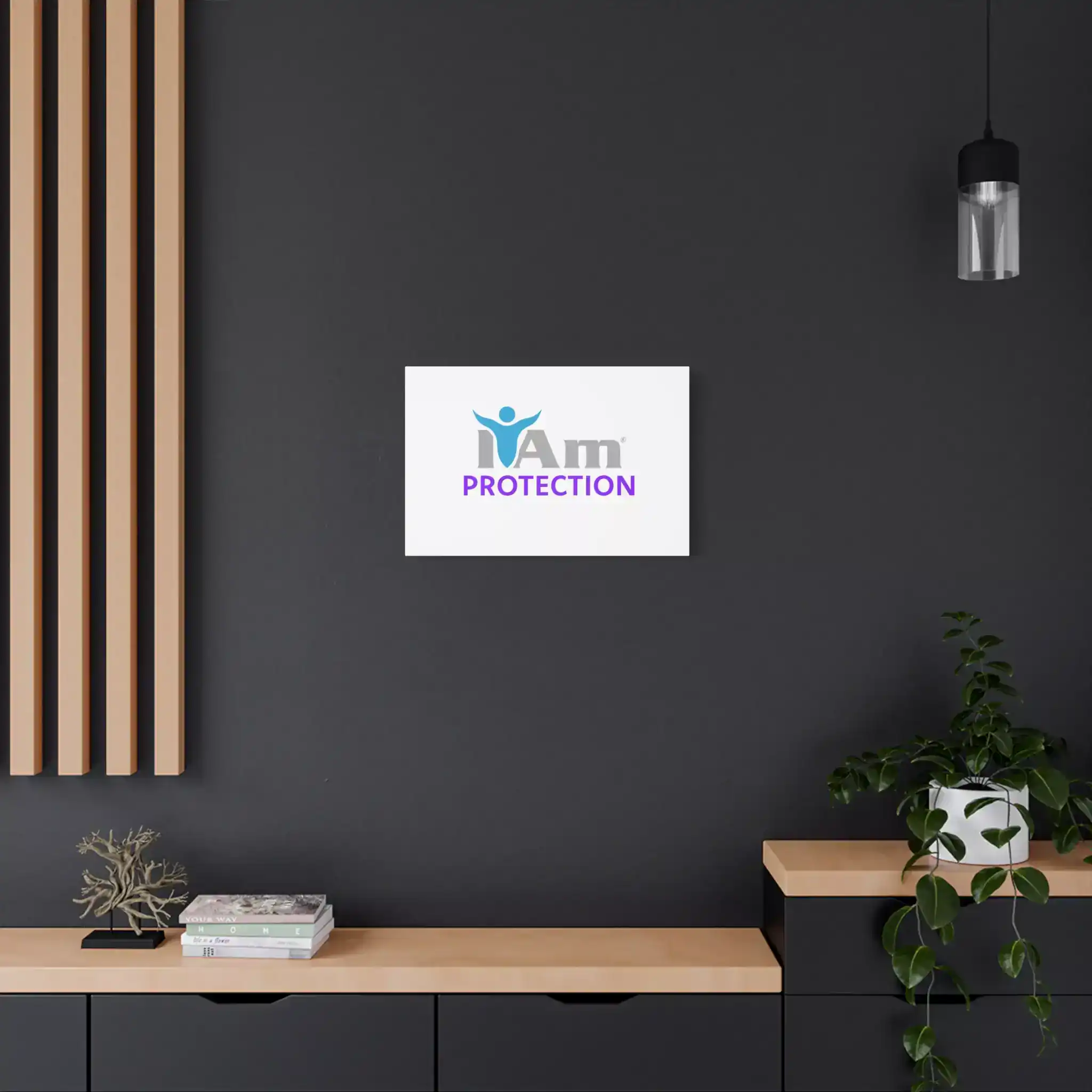 9998037980154481848_2048.webp Modern interior with 'I Am Protection' canvas wall art on dark wall.