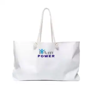 White canvas tote bag with 'I Am Power' logo and handles for travel or daily use.
