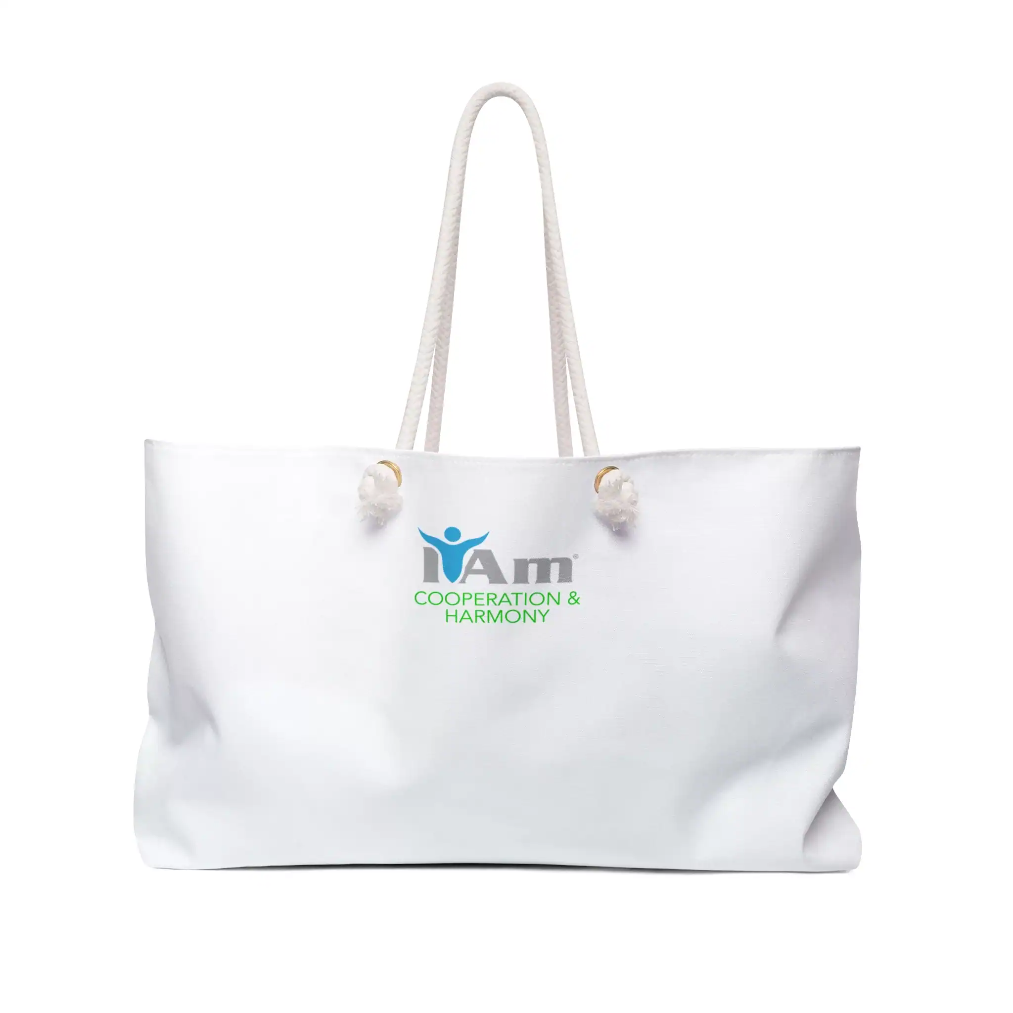 White canvas tote bag with 'I Am Cooperation and Harmony' logo and handles.