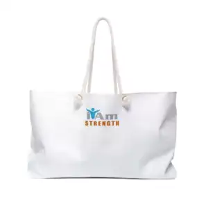 White canvas travel tote bag with 'I Am Strength' logo and rope handles.