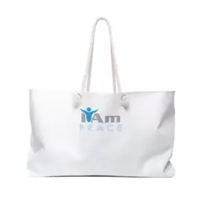 White canvas tote bag with 'I Am Peace' logo and rope handles for travel.